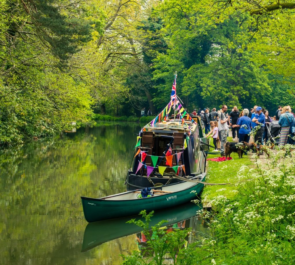 Image of basingstoke canal, with a canal barged and canoe