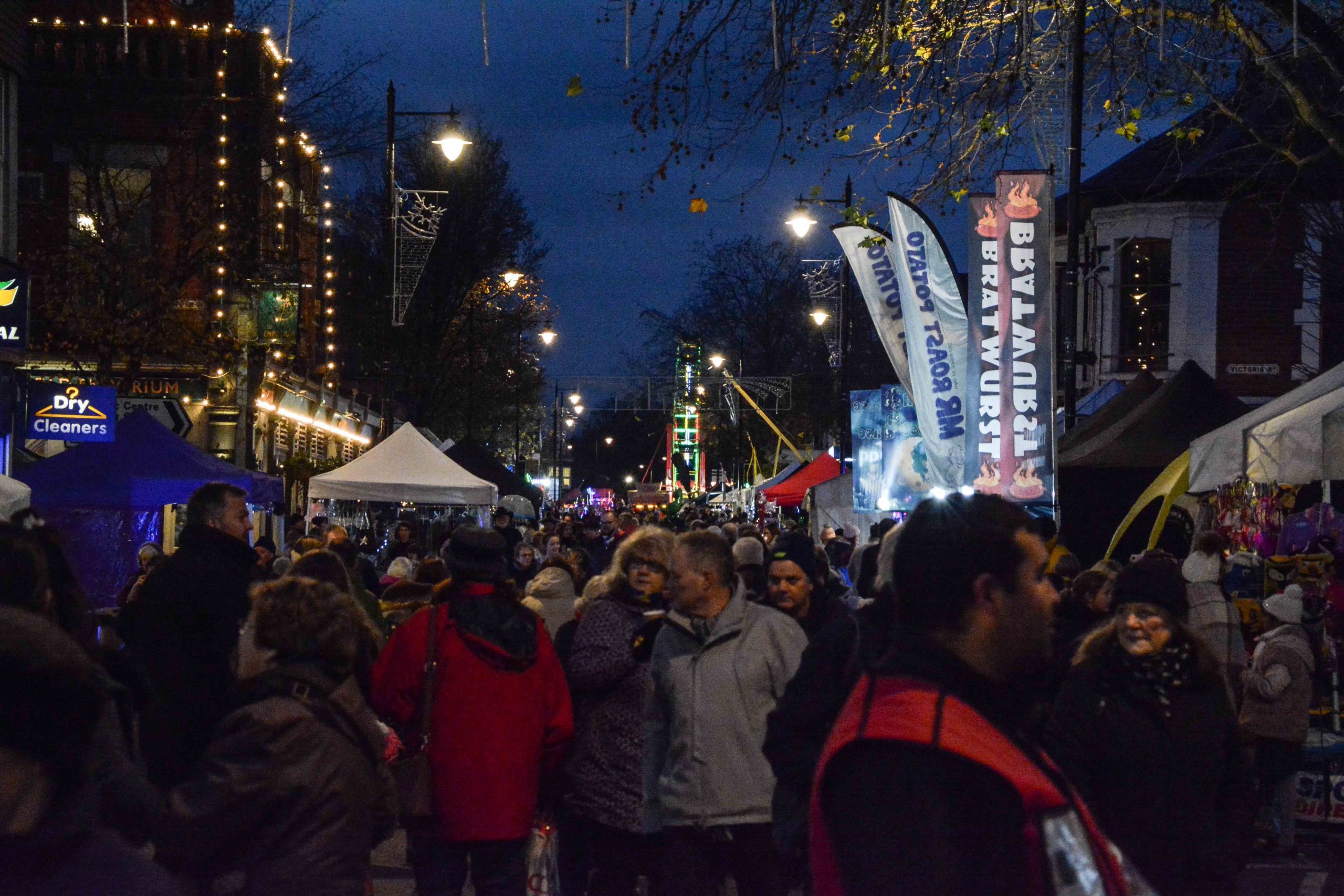 Image of fleet Christmas festival crowds along the highstreet, taken in the evening