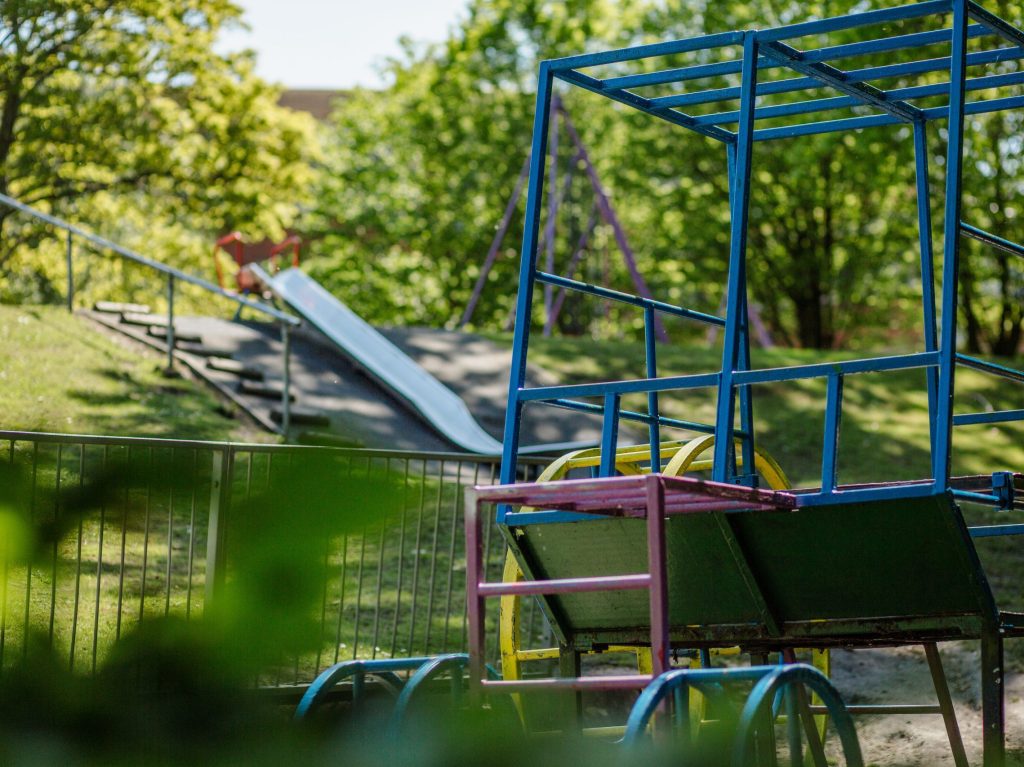Image of brightly coloured tractor climbing frame and slide at The View play park.