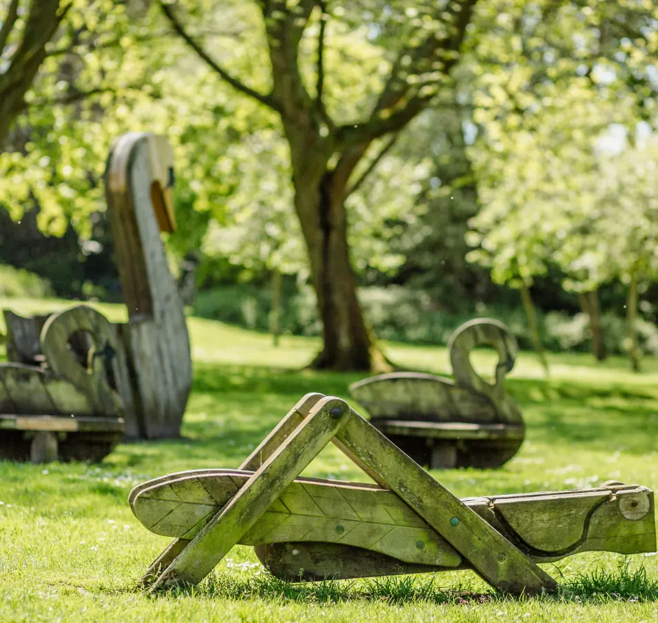 Image of wooden swan structures in Calthorpe park