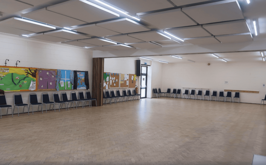 Image of Ancells Farm Community Centre's main hall - a large open plan room with a sliding room divider