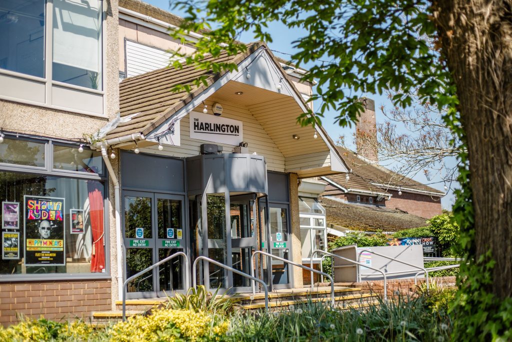 Image of the front of The Harlington building on a sunny day
