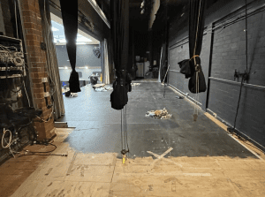 Image of harlington stage being painted black